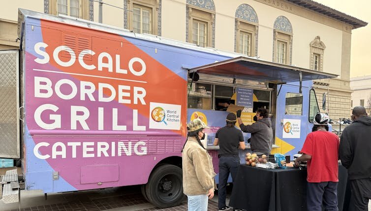 Social Border Grill delivers food as part of World Central Kitchen relief efforts at an Eaton Fire temporary shelter in Pasadena, Calif., on Jan. 9, 2025.