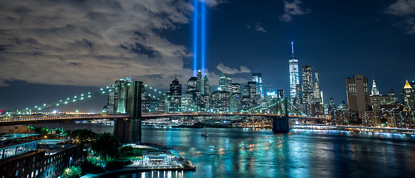 A breathtaking view of the 9/11 Lights and Brooklyn Bridge.