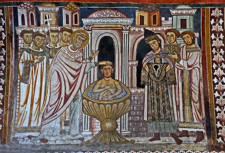 A mosaic of St. Silvester baptizing Emperor Constantine from the Basilica Santi Quattro Coronati in Rome.