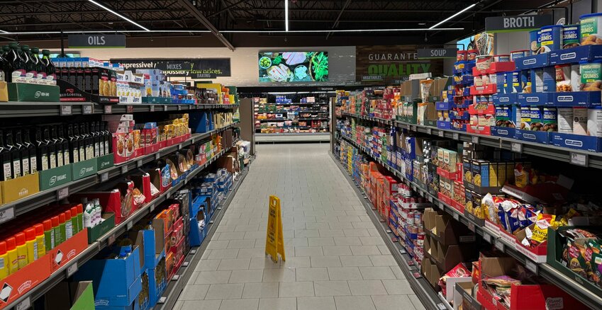 A look down a grocery aisle at Aldi.