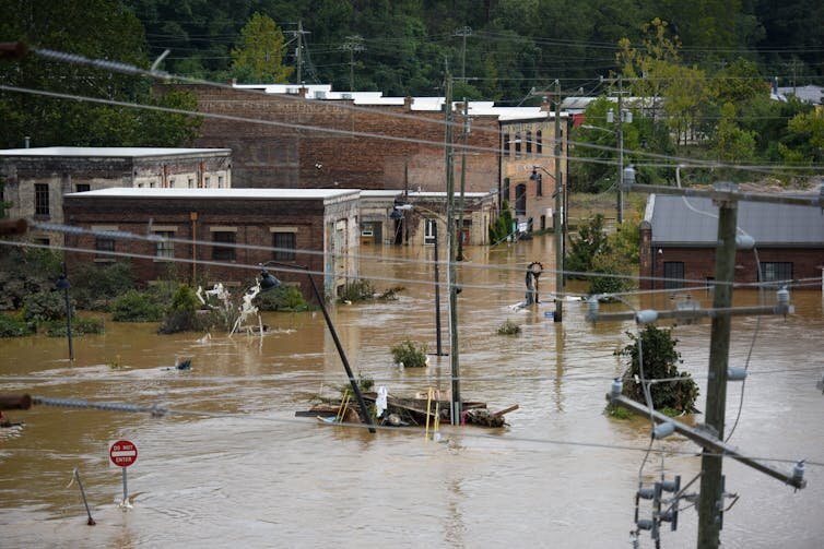 Flooding in Asheville, N.C., caused by Hurricane Helene in September 2024 sparked climate misinformation. Melissa Sue Gerrits/Getty Images