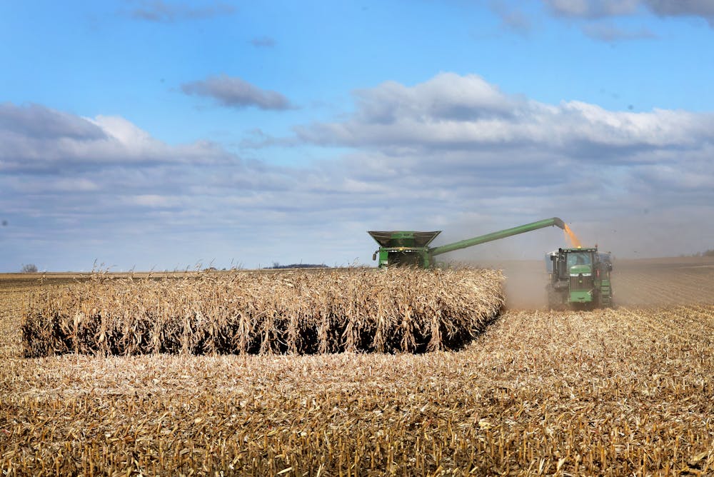 A farmer harvests corn near McIntire, Iowa, on Oct. 31, 2023.